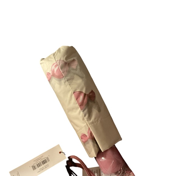 Coach Other - Coach  Cream Umbrella with candy wrapper design. NWT NEVER OPENED